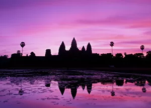 Cambodian Cambodian Cushion Collection: Asia, Cambodia, Siem Reap, Angkor Wat (b. 12th century). View of temple at dawn