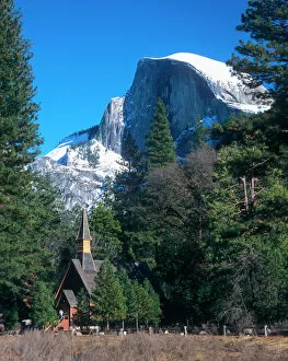 California Jigsaw Puzzle Collection: Californias Yosemite National Parks Half Dome rises above the multi denominational