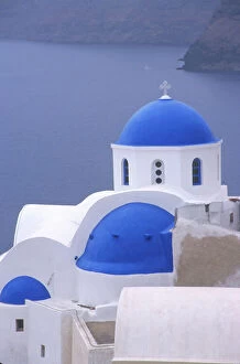 Domes Collection: Greece, Santorini, Oia. Blue domed church overlooking the Sea of Crete