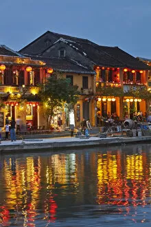 Thu Bon River Collection: Restaurants reflected in Thu Bon River at dusk, Hoi An (UNESCO World Heritage Site)