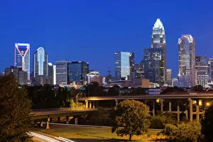 Related Images Canvas Print Collection: USA, North Carolina, Charlotte, elevated view of the city skyline from Route 74, dawn
