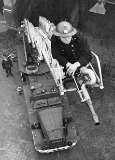 High Collection: Blitz in London -- AFS firefighter on ladder, WW2