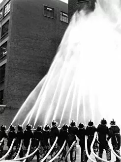 Firefighters Collection: Firefighters and hoses, LFB annual review, Lambeth HQ LFB150