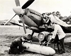 Battle of Normandy (D-Day) Collection: A modified auxiliary fuel tank being filled with beer, Bognor Regis, 1944