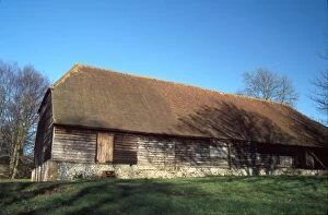 David Johnston Photographic Print Collection: Wooden and flint barn at Watergate House Farm, West Marden, West Sussex