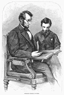 President Collection: (1809-1865). 16th President of the United States. Lincoln at home with his son Thomas Todd (Tad)