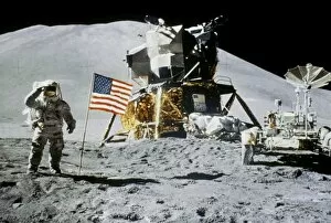 Apollo missions Mouse Mat Collection: Astronaut Jim Irwin saluting the American flag by the lunar rover