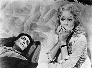 Movie Collection: FILM: BABY JANE, 1962. Joan Crawford, left, and Bette Davis as sisters in What Ever Happened to