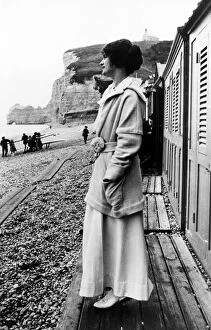 Designer Collection: GABRIELLE COCO CHANEL (1883-1971). French fashion designer. Photographed on the beach in Etretat