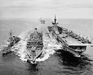 Royal Navy Collection: KOREAN WAR: SHIP REFUELING. The destroyer USS Shelton and the aircraft carrier USS Antietam