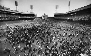 Baseball Stadiums Photo Mug Collection: NEW YORK: POLO GROUNDS. Crowd of baseball fans pouring onto the field at the Polo Grounds in New