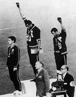 United States of America Canvas Print Collection: OLYMPIC GAMES, 1968. American runners Tommie Smith (center) and John Carlos (right)