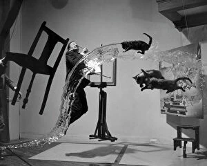 Surrealism Photographic Print Collection: SALVADOR DALI (1904-1989). Spanish painter. Photographed with objects, including cats