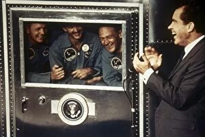 29 Dec 2010 Photo Mug Collection: SPACE: APOLLO 11. President Richard M. Nixon applauds astronauts Neil Armstrong, Michael Collins
