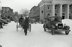 Vermont Collection: VERMONT: WOODSTOCK, 1940. Woodstock, Vermont, on Saturday afternoon after a snow storm