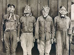 Soldiers in World War I Photographic Print Collection: WORLD WAR I: GAS WARFARE. American soldiers demonstrating the different types of gas masks worn by