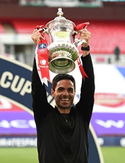 Sporting Venues Greetings Card Collection: Arsenal's Mikel Arteta Lifts FA Cup After Empty Arsenal v Chelsea Final