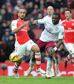 Arsenal v Aston Villa 2014-15 Fine Art Print Collection: Theo Walcott Outmaneuvers Jores Okore: Arsenal vs Aston Villa, Premier League 2014-15