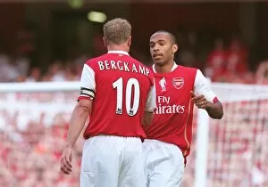 Related Images Collection: Thierry Henry celebrates scoring with Dennis Bergkamp
