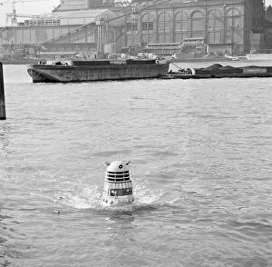 Film Mouse Mat Collection: A Dalek emerges from the river Thames at the jetty near Battersea Church Road