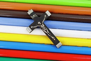 Gautama Collection: Christian cross and colored pencils. Catechism. Christian curch