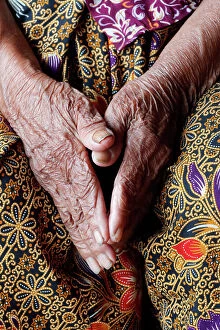 Evolve Metal Print Collection: Close-up shot of hands of a senior woman in his 80 years old