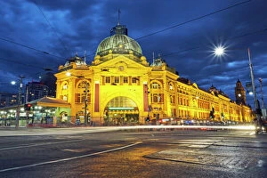 Vibrant Color Collection: Facade of Flinders Street station illuminated at night