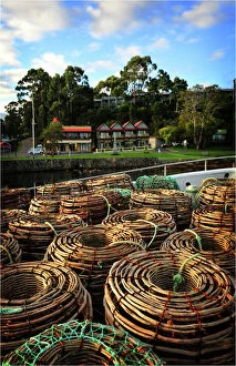 Fishing Industry Collection: Lobster pots stacked on the Strahan wharf, west coastline of Tasmania