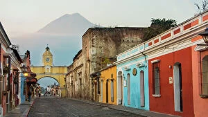 Top Sellers - Art Prints Canvas Print Collection: Agua Volcano and Arco de Santa Catalina (Santa Catalina Arch) in Antigua Guatemala