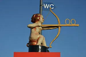 Human Respresentation Collection: Archer Cupid as a toilet sign, Oktoberfest, Munich, Upper Bavaria, Bavaria, Germany