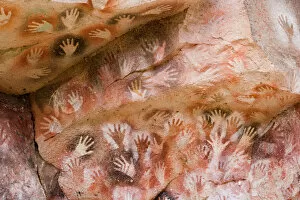 Scenic landscapes Premium Framed Print Collection: Argentina, Rio Pinturas, Cueva de los Manos, imprints of human hands on rock