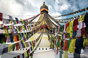 Kathmandu Collection: Prayer flags with the Boudhanath Stupa in Kathmandu, Nepal