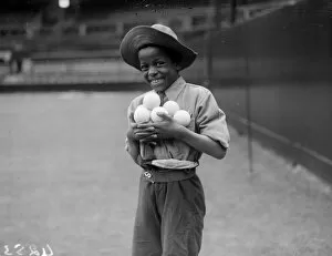 Fox Photo Library Poster Print Collection: Smiling Ball Boy