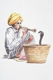 Fine art Metal Print Collection: Snake charmer playing flute-like instrument, snake emerging from basket in front