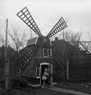 28 Aug 2015 Canvas Print Collection: Five-year-old Denise Holmes and her sister Nicola, two, now have a windmill at