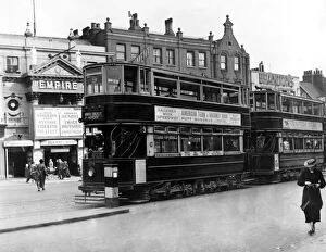 Islington Fine Art Print Collection: Trams outside the Islington Empire London 1 June 1936