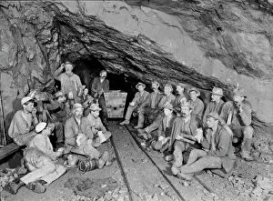 Trolley Collection: East Pool Mine, Illogan, Cornwall. 1893. Group of Cornish miners at rest at the 310 level