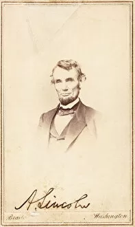 President Collection: Abraham Lincoln, signed carte-de-visite, 1864 (vignette, mount, gold-ruled border, ink)