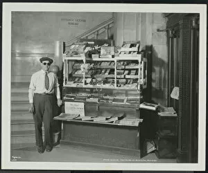Related Images Photo Mug Collection: Blind news dealer, John Martie, at his stand at the south end of the Municipal Building