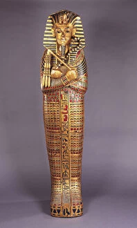 Negative Concept Collection: A gilt and polychrome painted wood model of the third coffin of King Tutankhamen