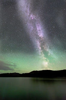 Celestial Collection: Aurora borealis and Milky Way above Fish Lake, Yukon, Canada