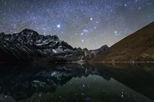 Related Images Fine Art Print Collection: Celestial sky with Sirius, Orion and Aldebaran shining bove Pharilapche Peak in Nepal