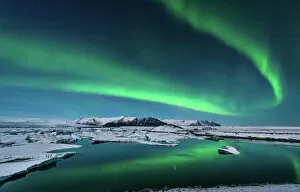 Aurora Collection: The northern lights dance over the glacier lagoon in Iceland