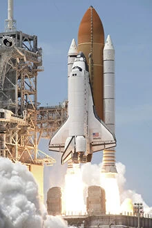 Thrust Collection: Space shuttle Atlantis twin solid rocket boosters ignite to propel the spacecraft