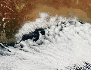 Space Photo Mug Collection: Unusual cloud formations crowd the coastline of Australia
