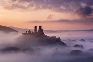 Related Images Collection: Corfe Castle, early morning llight and mist, Corfe Castle, Dorset, UK. September 2014