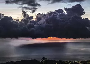 Catalogue13 Collection: Dramatic sunset with storm clouds over Roseau, Caribbean sea view in Dominica, Lesser Antiles