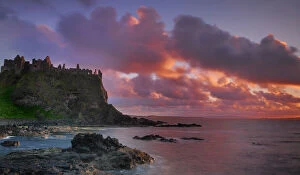 Dramatic Collection: Dunluce Castle at sunset, North Antrim coast, County Antrim, Northern Ireland, UK
