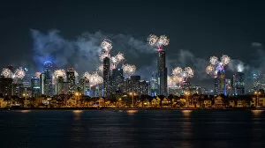 Artifical Light Collection: Fireworks over Melbourne city skyline for New Year celebrations