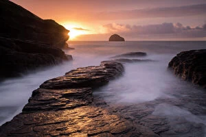 Setting Sun Collection: Trebarwith Strand at sunset and high water, Trebarwith, north Cornwall, UK. October 2017